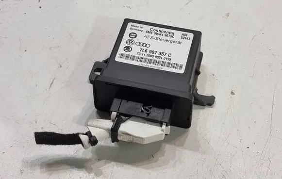 Volkswagen Touareg I Light module LCM 7L6907357C