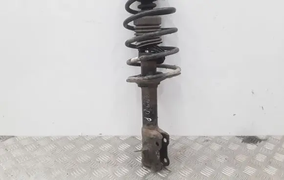 Nissan Almera N16 Front shock absorber with coil spring