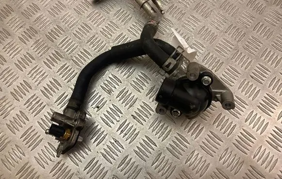 Thermostat/thermostat housing