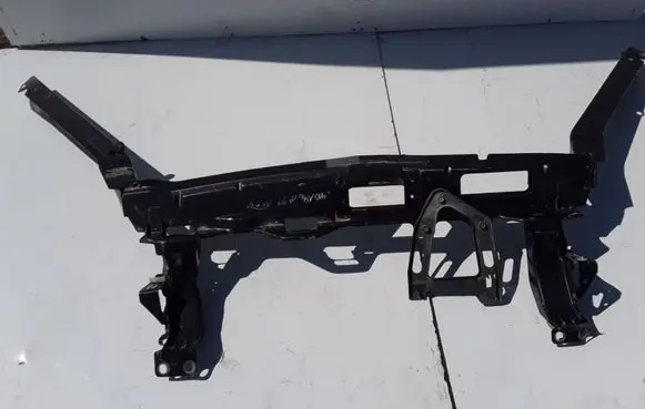 Top upper radiator support slam panel