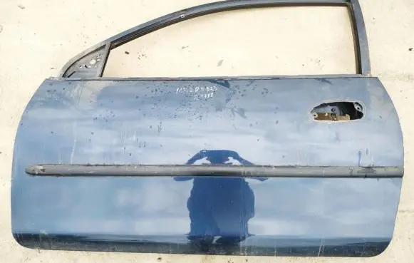 Mazda 323 Front door melynos