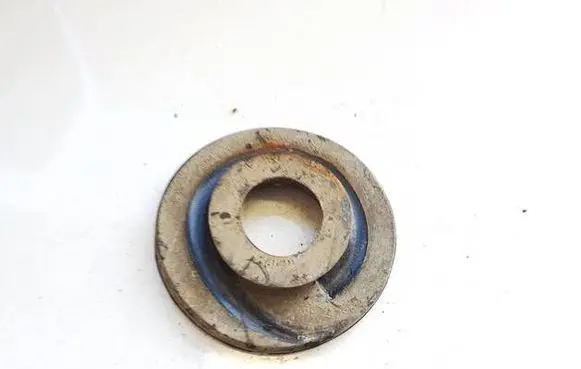 Volkswagen Touran I Front coil spring rubber mount 1K0512297C