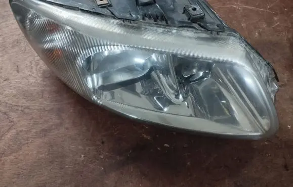 Chrysler Voyager Headlight/headlamp 04857710AB