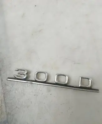 Mercedes-Benz W123 Manufacturers badge/model letters 1238170915