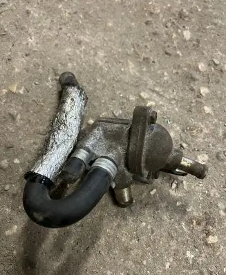 Thermostat/thermostat housing