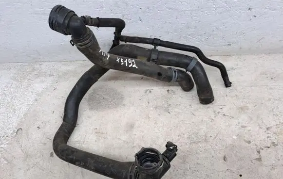 Volkswagen Golf VII Engine coolant pipe/hose 5Q0121049
