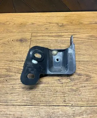 Opel Corsa D ABS pump bracket 13215999 329510614