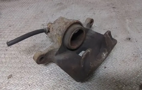 Mitsubishi Lancer VIII Front brake caliper