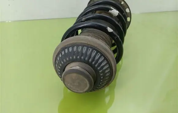 Opel Astra H Front shock absorber with coil spring