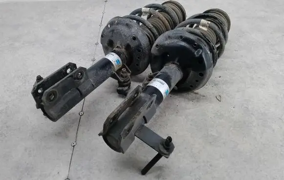 Opel Astra J Front shock absorber/damper 2218365122183644