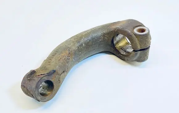 Cadillac SRX Lower shock absorber bracket 25764674