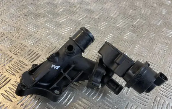 Thermostat/thermostat housing