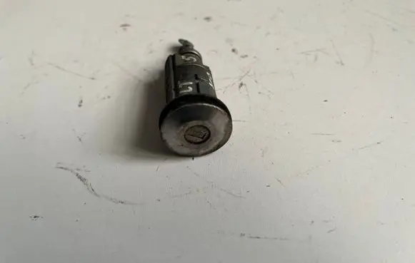 Mitsubishi Colt Front door lock (next to the handle) 