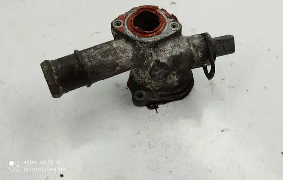 Thermostat/thermostat housing