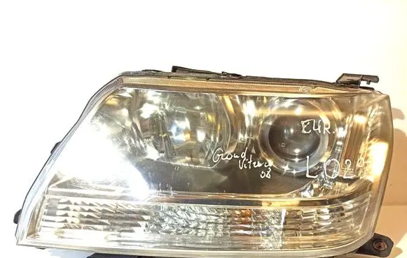 Suzuki Grand Vitara II Headlight/headlamp 10059079