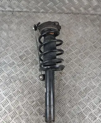 Volkswagen Tiguan Front shock absorber with coil spring