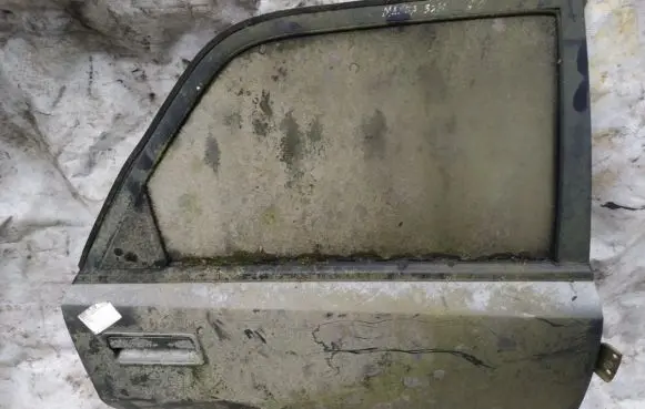 Mazda 323 F Rear door pilkos
