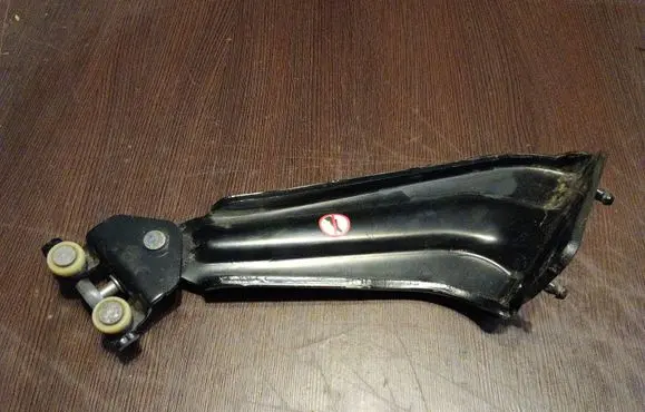 Peugeot Partner III Sliding door lower roller guide/hinge 9816965980