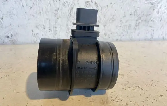 Volkswagen Tiguan Mass air flow meter 0281002735 03G906461C