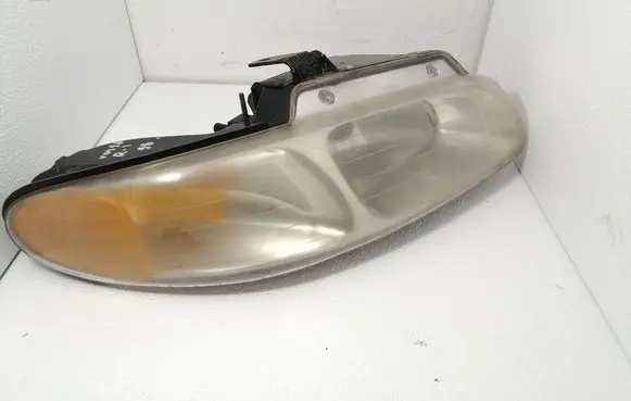 Chrysler Voyager Headlight/headlamp 04576313AD