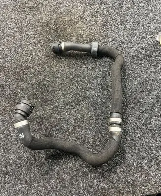 Mercedes-Benz C W206 Engine coolant pipe/hose A0089976789