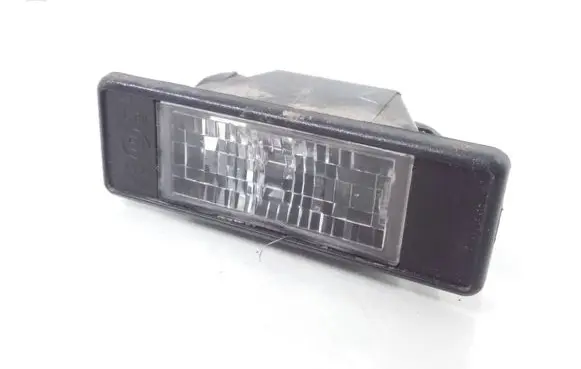 Nissan Pulsar Number plate light 25300100