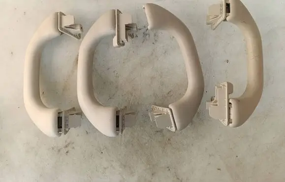 Volkswagen PASSAT B7 A set of handles for the ceiling 1K0857607