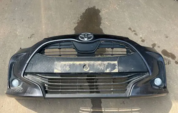 Toyota Yaris XP210 Front bumper 53111K0010 53101K0050