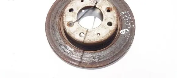 KIA Carens I Rear brake disc neventiliuojamas