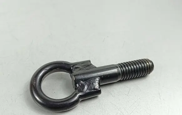 Towing hook eye