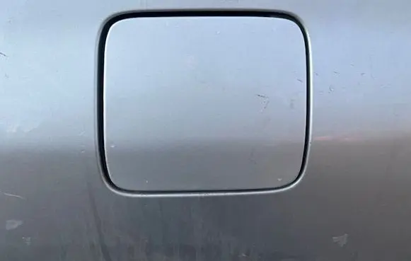 Mazda Tribute Fuel tank cap trim 