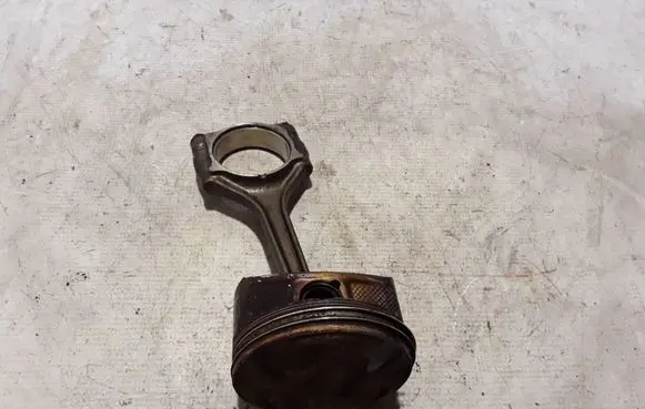 Piston with connecting rod