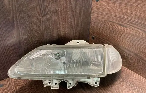 Renault Laguna I Headlight/headlamp 7700820118