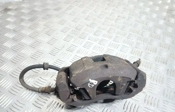 Mitsubishi Lancer VIII Front brake caliper