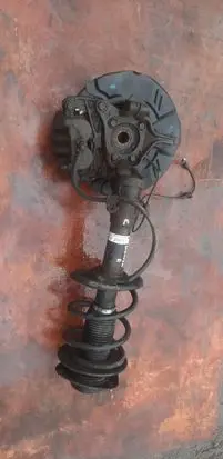 Subaru Impreza III Front shock absorber with coil spring 