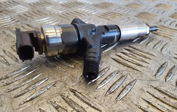 Subaru Impreza III Fuel injector 16613AA020 10K05311