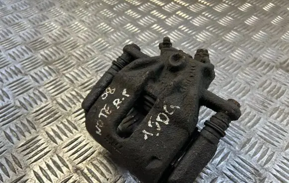 Nissan Note (E11) Front brake caliper