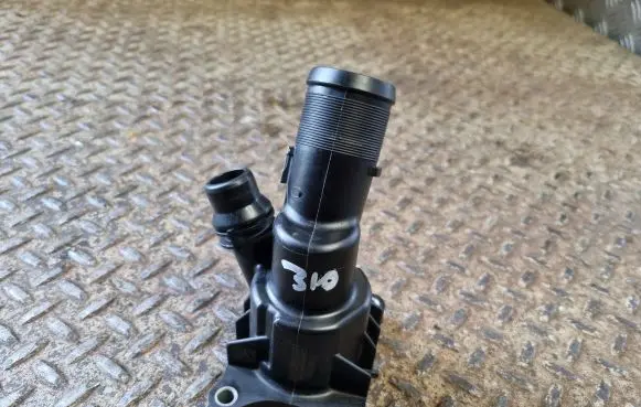 Thermostat/thermostat housing
