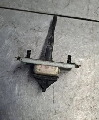 Front door check strap stopper