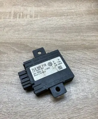 Volkswagen Touareg I Alarm control unit/module 7L0907719