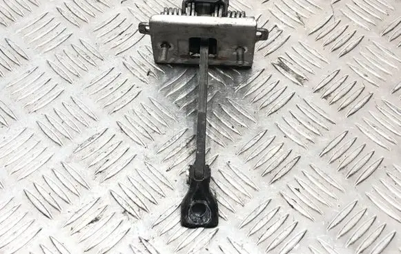 Front door check strap stopper