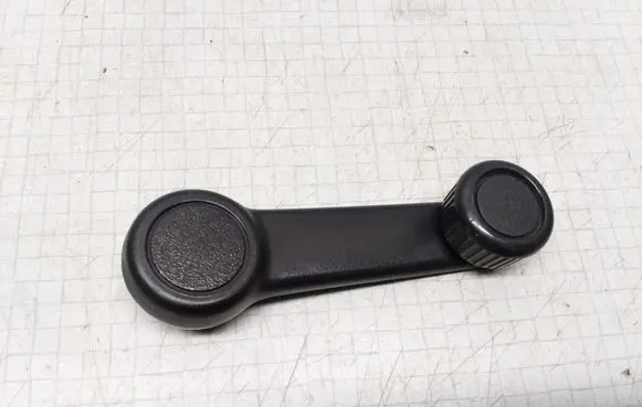 Mazda 323 F Rear door window winding handle 