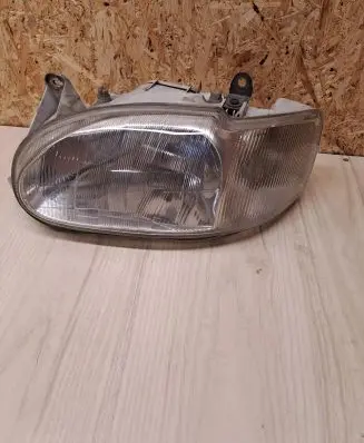Ford Escort Headlight/headlamp E95073