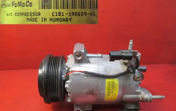 Ford Fiesta Air conditioning (A/C) compressor (pump) C1B119D629AG