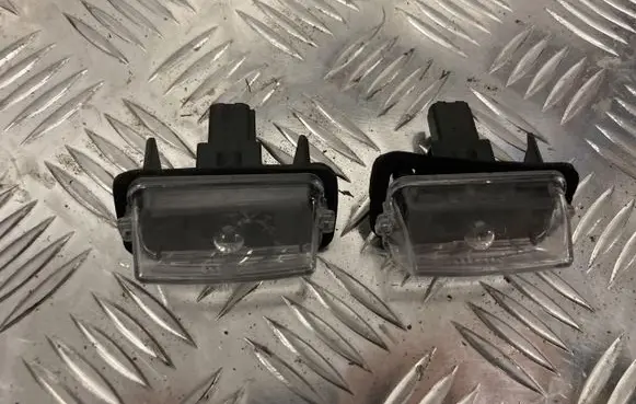 Toyota Yaris XP210 Trunk door license plate light bar PK10096