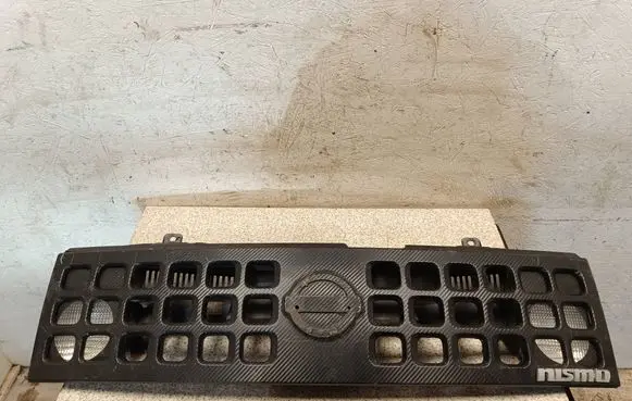 Nissan Cube Z11 Front bumper upper radiator grill 62310