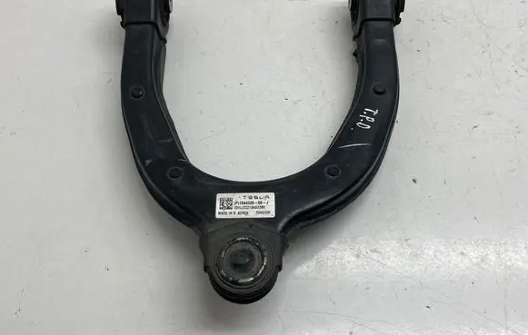 Tesla Model 3 Front upper control arm/wishbone 104432600J