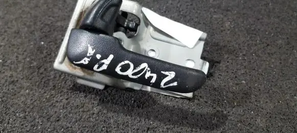 Mazda 323 Front door interior handle