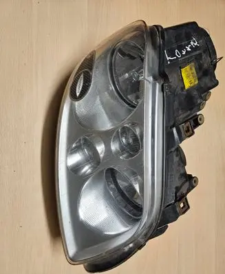 Volkswagen Touran I Headlight/headlamp 0301205602