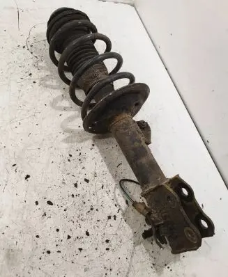 Front shock absorber with coil spring